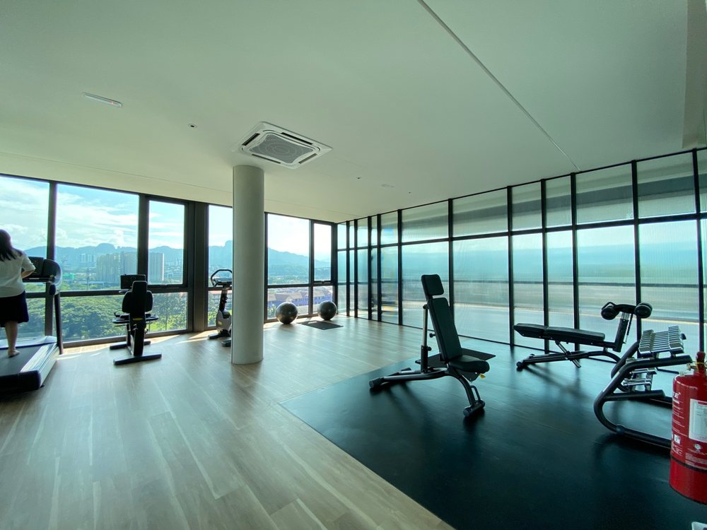 M Adora cantilevered glass gymnasium