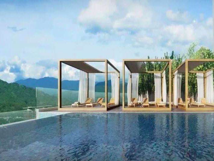 M Adora horizon pool with poolside cabanas